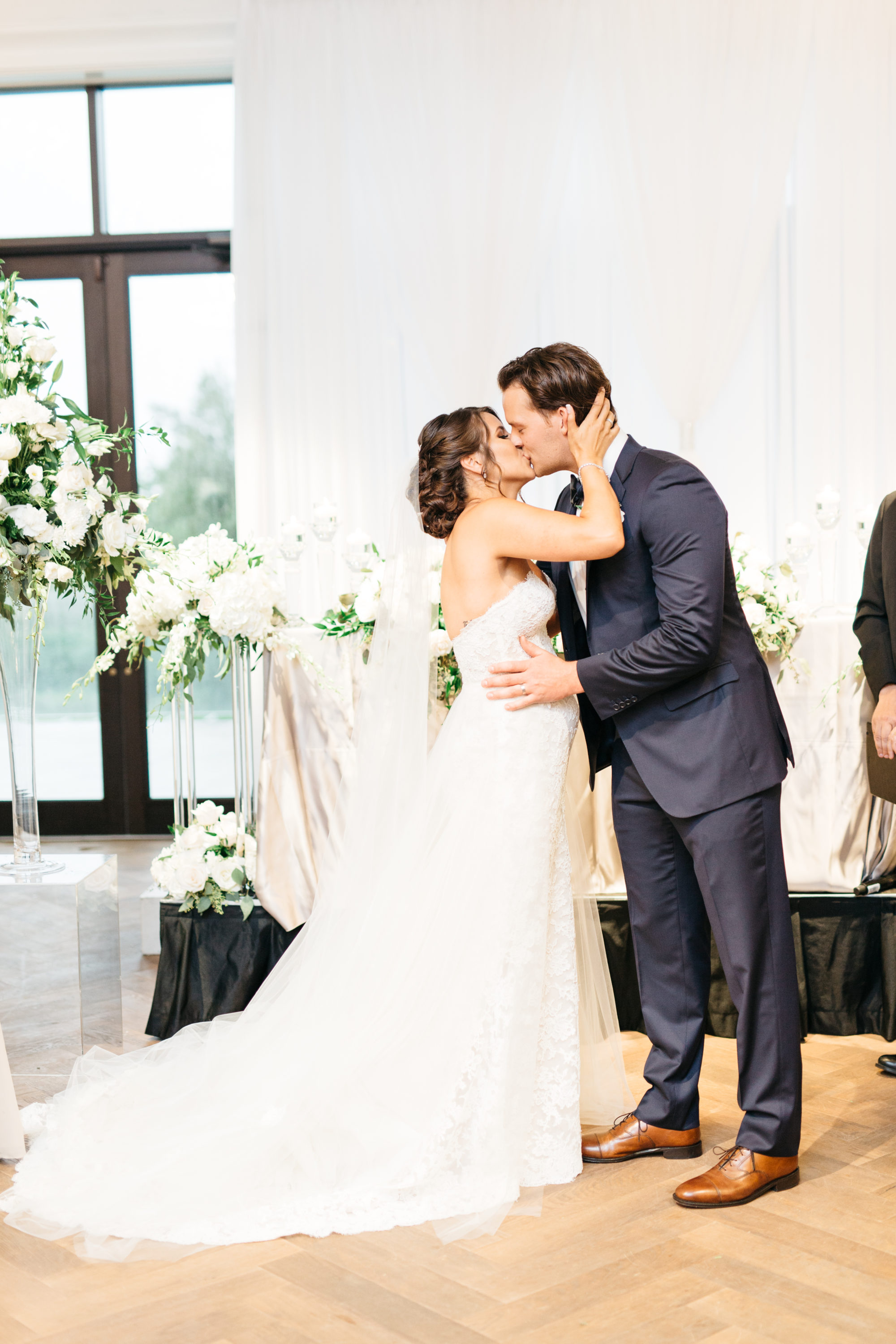 The bride and grooms first kiss