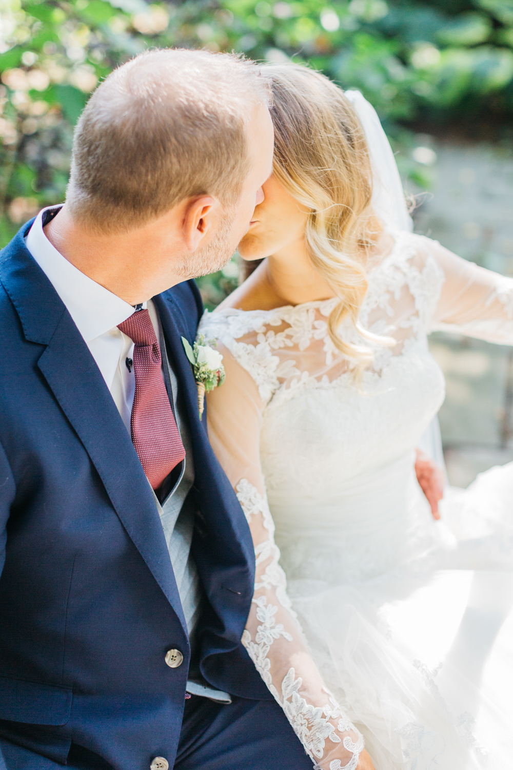 Bride and groom kissing at Gracewood Estates Wedding