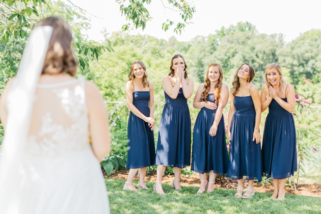 First look with bridesmaids at Stonewall Estates
