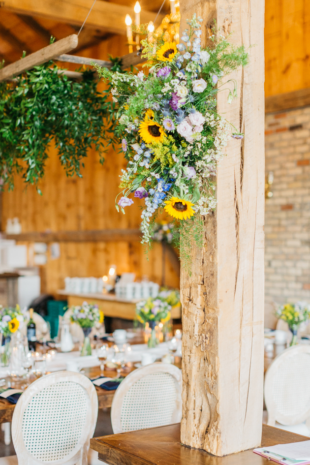 Floral arrangements in barn at Stonewall Estates